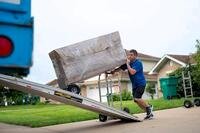 A mover loads boxes.